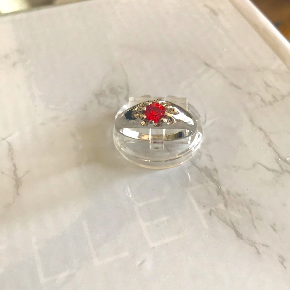 Dainty silver metal alloy rhinestone ring.